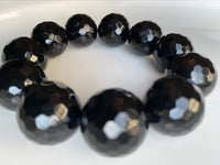 
              20mm Black Agate Gemstone Bracelet
            