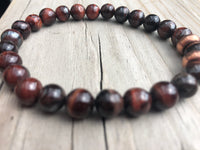
              Red Tiger's Eye Gemstone Bracelet
            