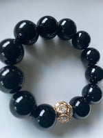 
              16mm Onyx Gemstone Bracelet
            